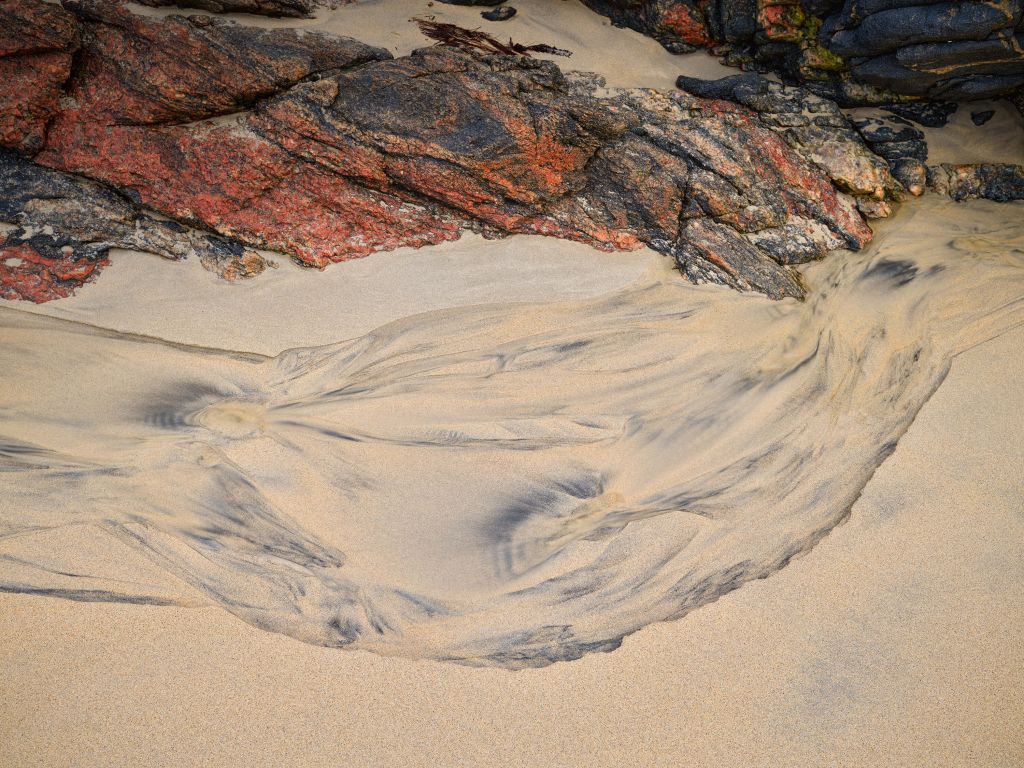 Figure de sable et roche