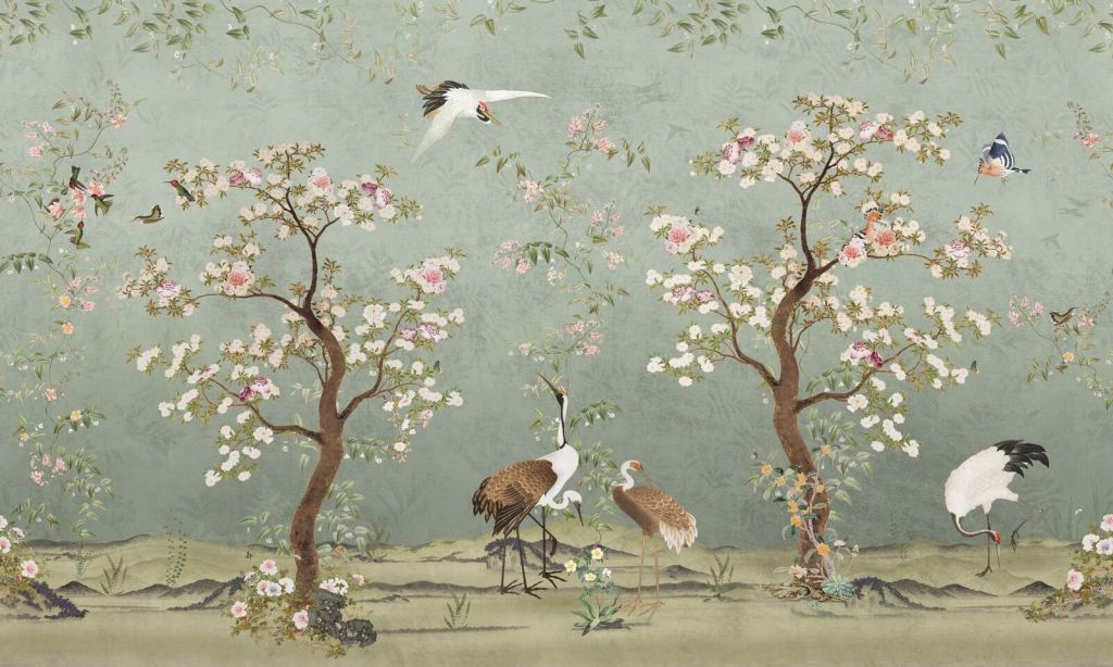 Arbres en fleurs avec des grues sur fond vert jade