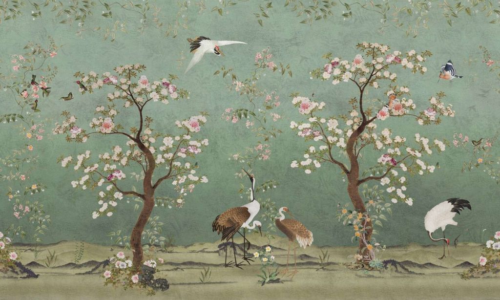Gracieuses grues dans un paysage de fleurs.