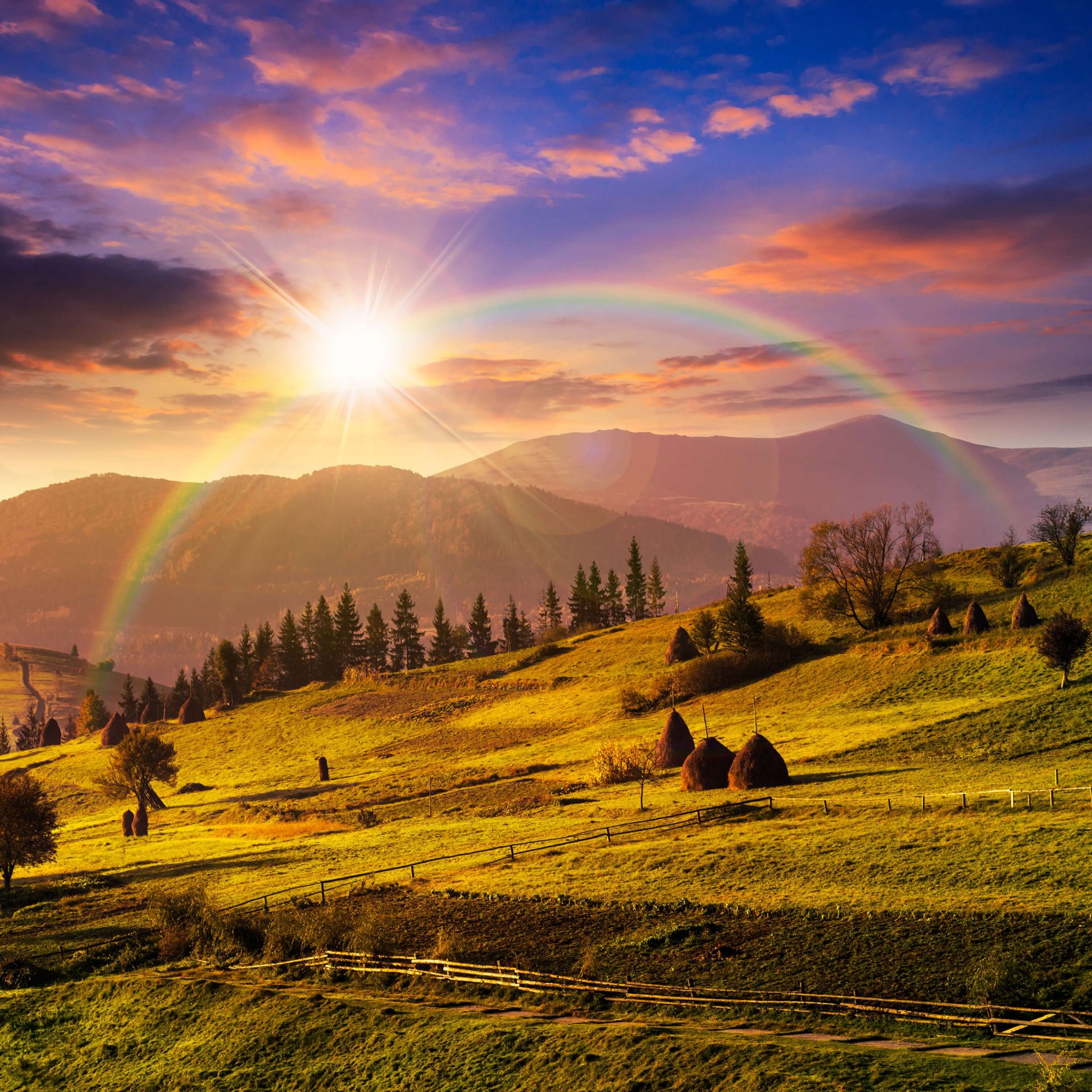 Meules&#x20;de&#x20;foin&#x20;dans&#x20;un&#x20;paysage&#x20;de&#x20;montagne
